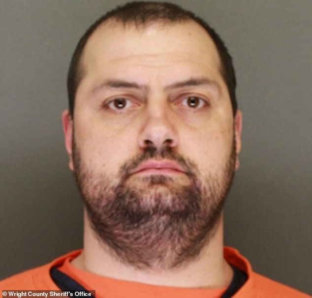 Delong is seen in his mugshot