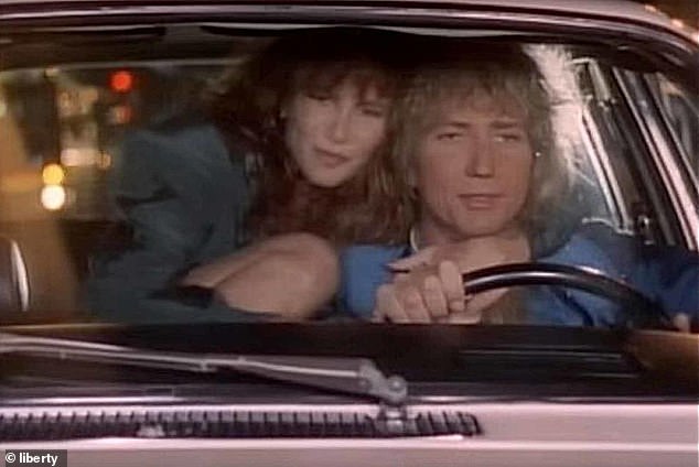 Both music videos starred Julie 'Tawny' Kitaen who became his second wife in 1989