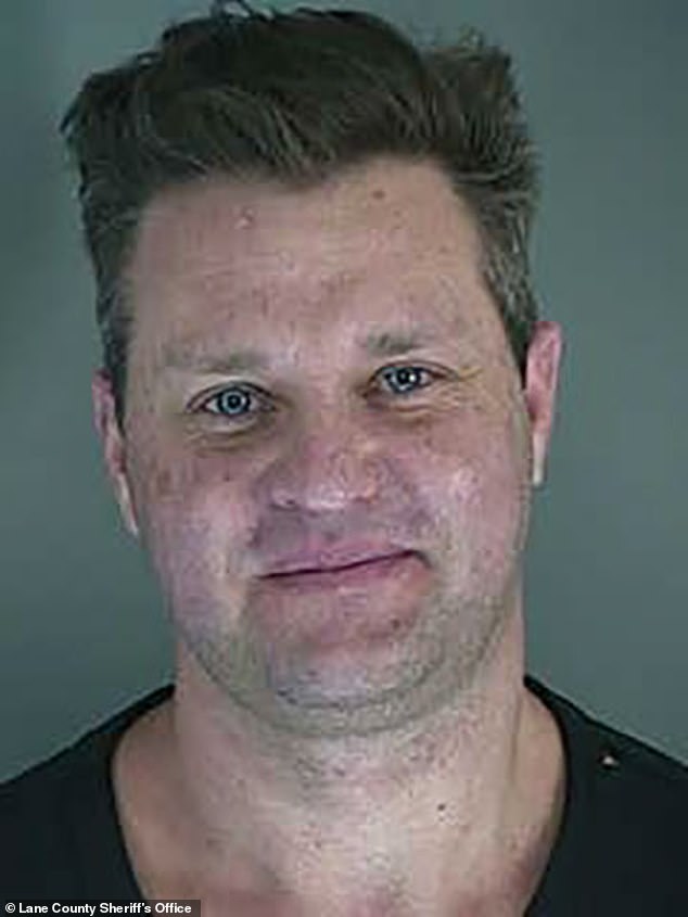 Bryan pictured following an arrest in October of 2020 in Eugene, Oregon