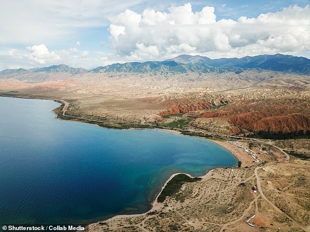 Issyk-Kul (pictured) has a maximum depth of 2,192 feet (668 metres), making it the eighth-deepest lake in the world