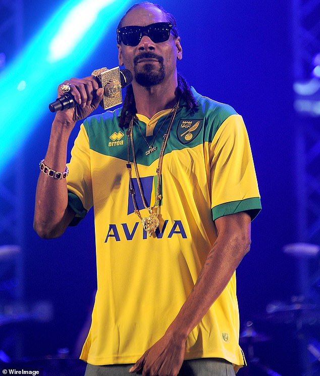 Is there a game happening today? We get you’re a fan, but it’s fancy dress and Halloween has passed. Pictured: Snoop Dogg in a Norwich City top at Radio 1's Big Weekend