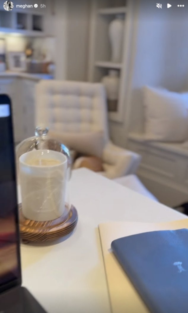 Hours before the collection was released, Meghan posted a clip on Instagram showing her working at her desk - but onlookers quickly spotted a blue notebook with her royal cypher on its cover