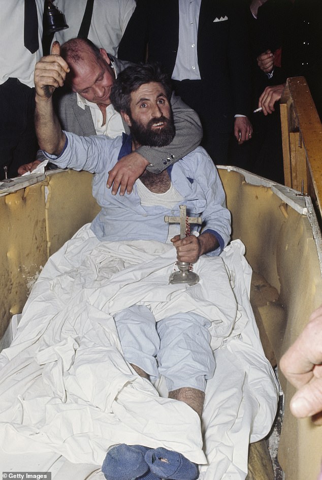 After 61 days, the coffin was exhumed to cheers