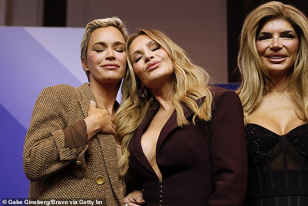 'I see it as a miracle,' she told the outlet. 'I feel so beyond grateful that I'm feeling better and that I'm able to be there more for my kids and my family'; seen with Judge and Teresa Giudice in Las Vegas last week