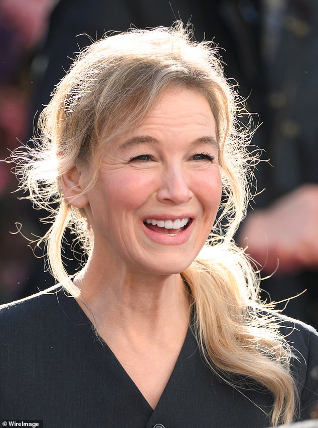 The 56-year-old Chicago actress looked happy as she wore light makeup with her blonde hair pulled up. But when she smiled for the camera her typical bee-stung puffy lips appeared smaller than unusual