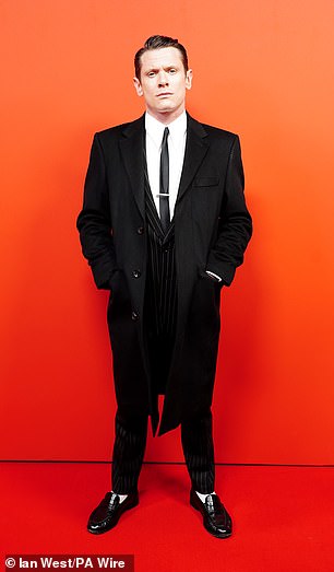 Jack O'Connell took style notes from Pierce as he too was wearing a pinstripe suit