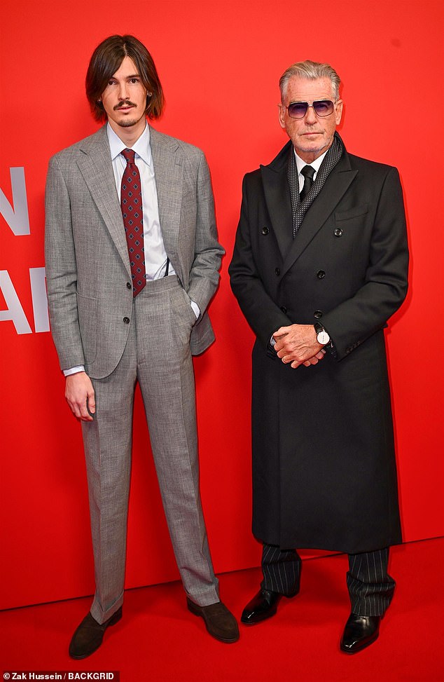 Pierce Brosnan , 72, meanwhile, had plenty of swagger as he arrived with his model son Dylan, 28, who looked cool in a grey suit