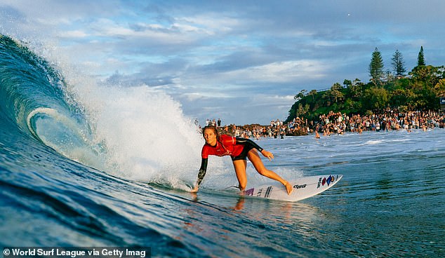 Only Kelly Slater (11 titles) has claimed more career silverware in the sport, with Gilmore surpassing Layne Beachley (seven titles) after her last triumph in 2022 (pictured, competing at the Gold Coast Pro last year)
