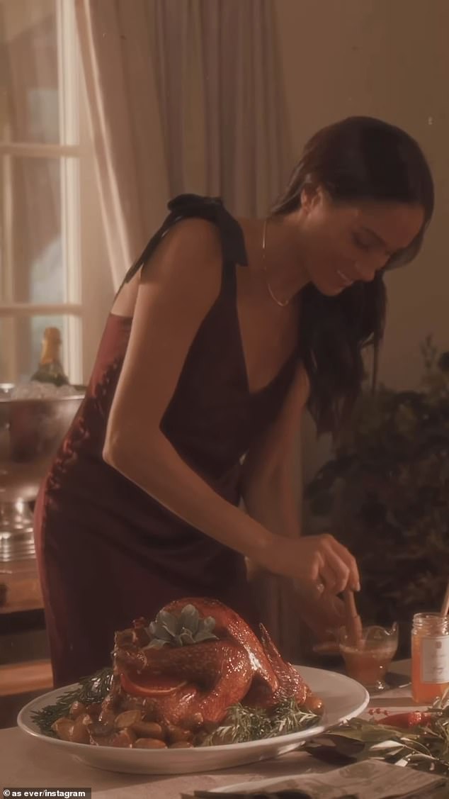 The official As Ever Instagram account shared footage of the brunette beauty looked fabulous in a burgundy holiday gown as she glazed a delicious turkey at her family's dinner table