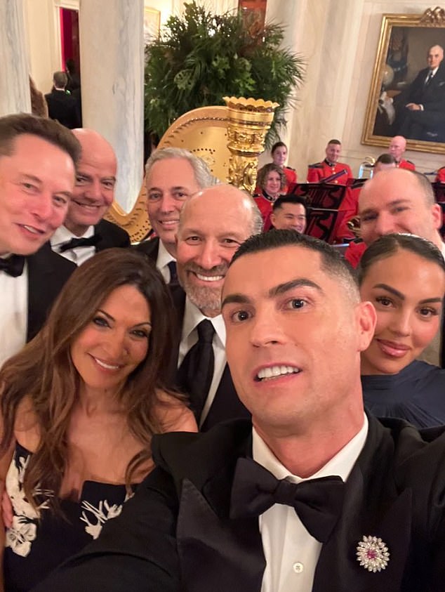 Cristiano Ronaldo was front and center of a selfie at the White House with (L to R): Elon Musk, Gianni Infantino, David Sacks, Allison Lutnick, Howard Lutnick, his fiancee Georgina Rodriguez and Greg Brockman