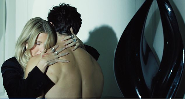 Goulding can't keep her hands off of the hunky actor as they enjoy a passionate clinch