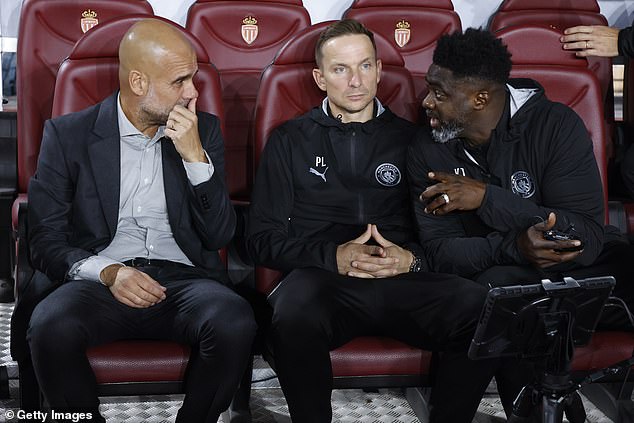 Pep Guardiola's new assistants Pep Lijnders (centre) and Kolo Toure (right) have both hit the ground running this season