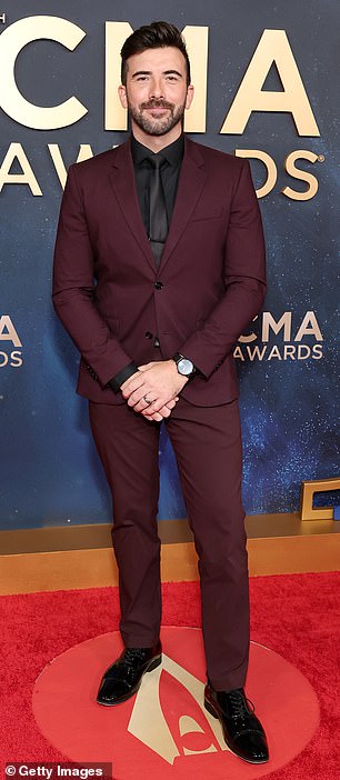 A little boring! Singer Jeremy Parsons attended the awards in a maroon-colored suit with a black top and matching tie. He wore black, patent leather shoes and a watch to complete the outfit