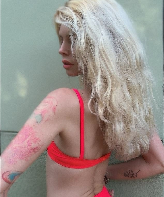 Here she is seen in a pink bikini that used to be worn by her mother