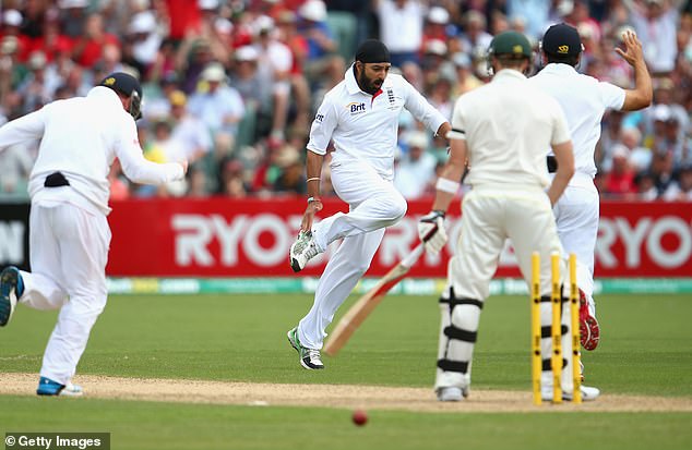 Panesar, seen celebrating taking the wicket of Smith in Adelaide back in 2013, claimed the Australia's comments show Sandpapergate remains a 'sensitive topic for him'