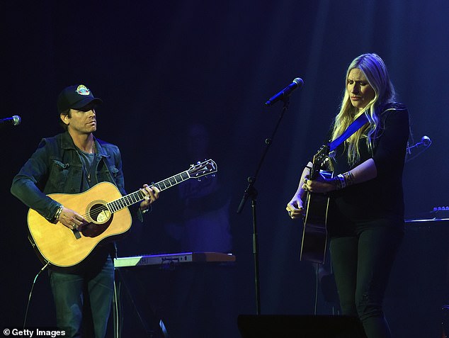 Holly is married to drummer Chris Coleman, having tied the knot with the star in 2009 (pictured together in 2017)