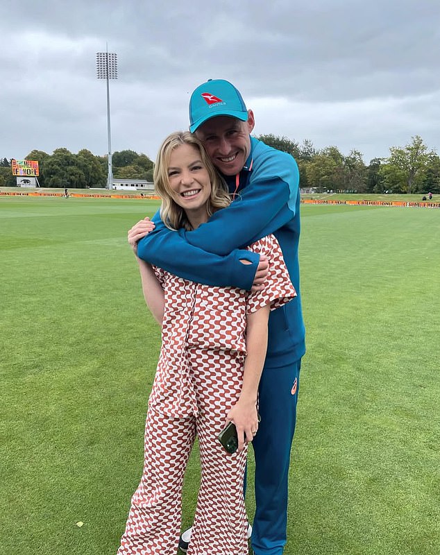 Rebekah Labuschagne is known for her fashion sense. She is seen here wearing a '70s-inspired top and trousers alongside husband Marnus
