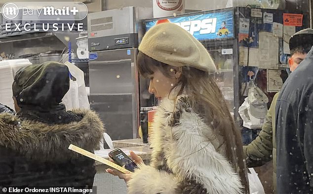 On Wednesday, after being ejected from Hole in the Wall she peered into a Chinese take-out across the street