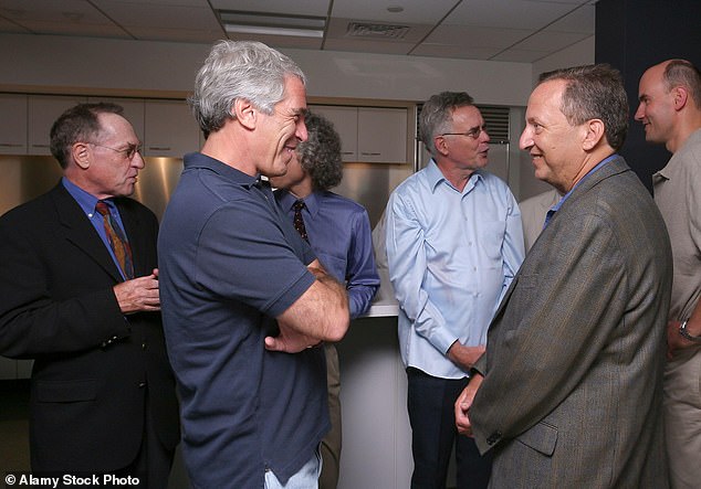 In email exchanges dated between 2013 and 2019, Summers and Epstein shared their thoughts about current events and politics - while also delving into the married economics professor's love life. Epstein is pictured smiling at Summers in 2004