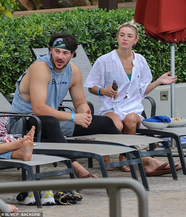 She is on vacation with baseball beau Paul Skenes (pictured) and a group of friends