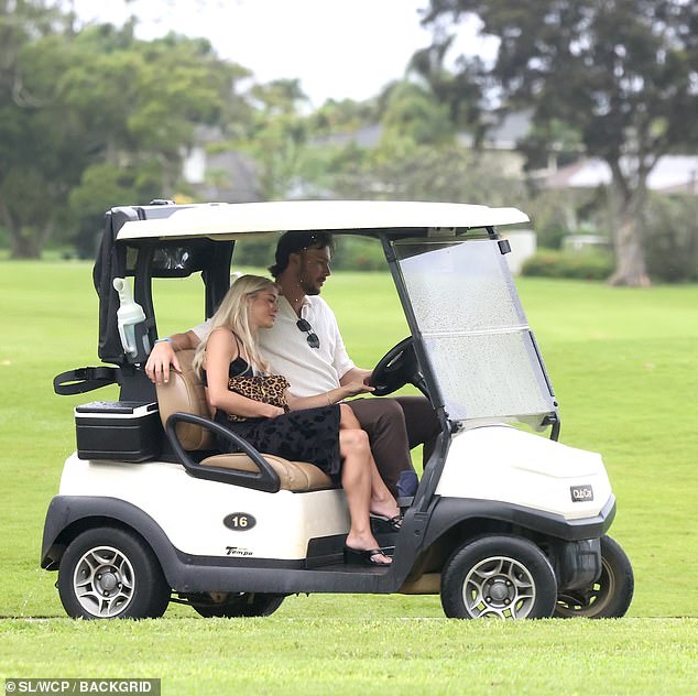 Dunne was seen resting her head on her man's shoulder as they enjoyed some alone time