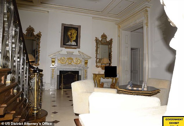 A sweeping staircase led to Epstein's personal office that was filled with dark wood and strange objects (Pictured: interior of Epstein's townhome)