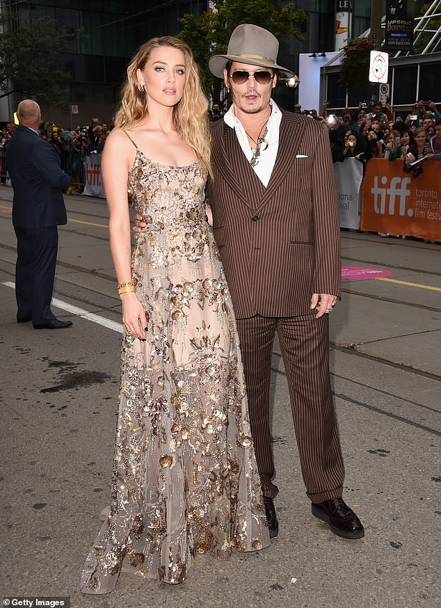 Johnny Depp with his now ex-wife, actress Amber Heard