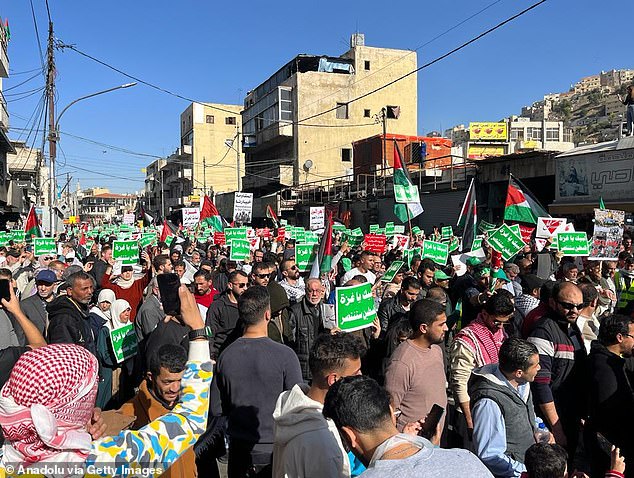People march towards Al-Nahl Square in solidarity with Palestine called by the Islamic Labor Front Party, the political wing of the Muslim Brotherhood (Ikhwan) after Friday prayers in front of Al-Husseini Mosque in Amman, Jordan on December 01, 2023