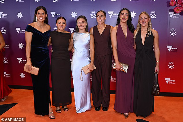 Riddell is the first North Melbourne player to win the best-and-fairest award in the league's 10 seasons and will lead the Kangaroos in Saturday's grand final against the Brisbane Lions (pictured, Kangaroos players L-R: Libby Birch, Jenna Bruton, Ash Riddell, Jasmine Garner, Blaithin Bogue and Ella Slocombe)