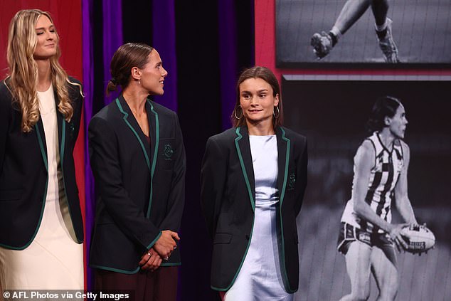 Riddell (right) who has featured in every game of North Melbourne's record 26-match winning streak, paid tribute to her teammates and coach Darren Crocker in her acceptance speech