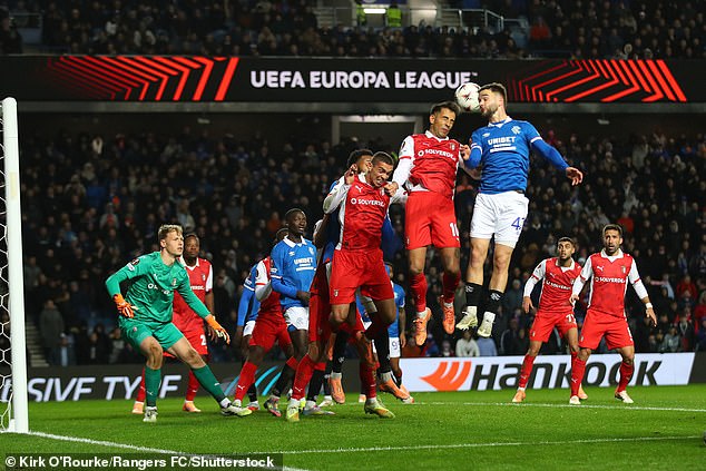 Raskin sees his headed attempt blocked by the Braga backline