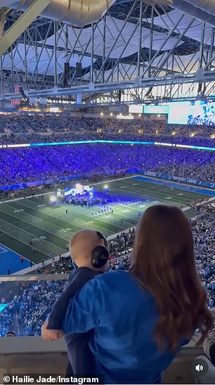 Meanwhile in the VIP suite, the 15-time Grammy winner's daughter Hailie Jade McClintock held little Elliot