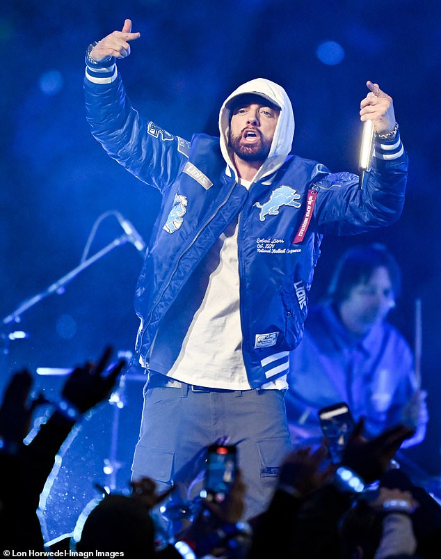 Sporting a Lions letterman jacket, Eminem dramatically arose from a platform to rap his 2002 hit Till' I Collapse, which was mashed-up with The White Stripes' 2000 song Hello Operator