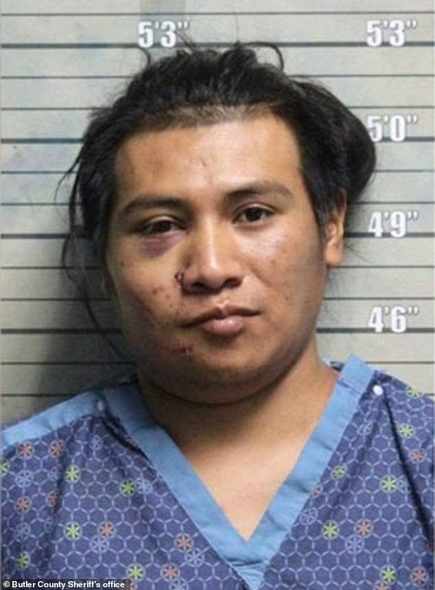 A 'grinning' Perez-Ventura, 27, is pictured in his mugshot. He was detained at the border in Texas in 2019 by ICE and deported to Guatemala but re-entered the country