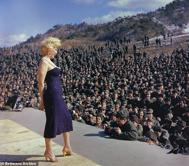 Marilyn performs for US troops in Korea in 1954 - but eight years later she was being flagged as a potential Communist