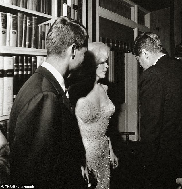 Marilyn lay in bed with her white telephone - having calmed herself with some pills, she started to call friends