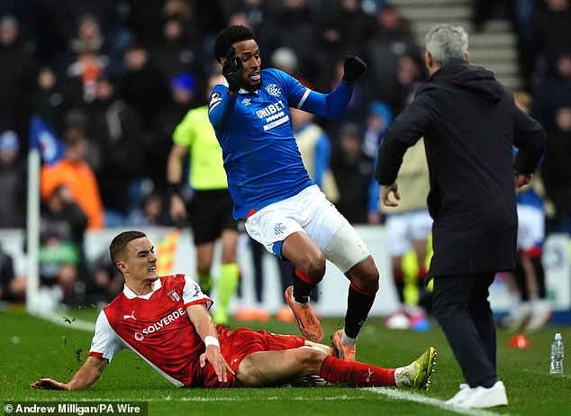 Ex-Celtic defender Gustaf Lagerbielke slides in on misfiring Rangers striker Youssef Chermiti