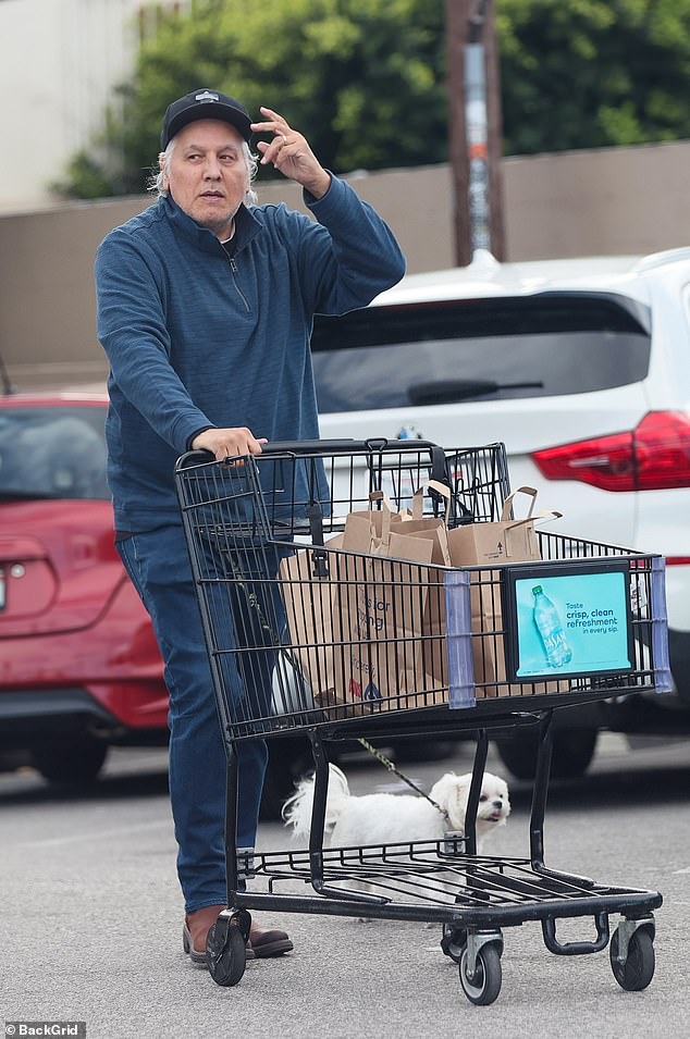 Beltran completed quite the grocery haul as he departed with numerous bags