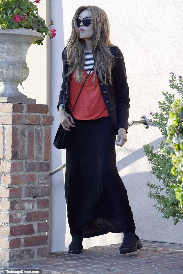 The actress, ageless at 79 and who first shot to fame as Bond girl Fatima Blush opposite Sean Connery in 1983's Never Say Never Again, was spotted in a chic ensemble in Beverly Hills