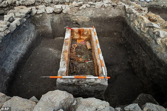 Archaeologists opened the sealed coffin to find the remains of a young woman who has not been disturbed for 1,700 years