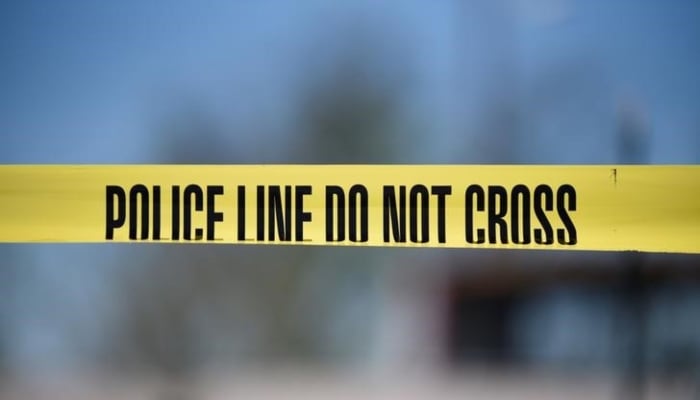 A crime scene tape can be seen in this image. — Reuters/File