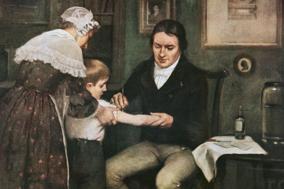 Dr Edward Jenner (1749-1823) performing his first vaccination against smallpox on James Phipps, a boy of eight, May 14, 1796, oil on canvas by Ernest Board (1877-1934), 1920-1930, United Kingdom, 20th century