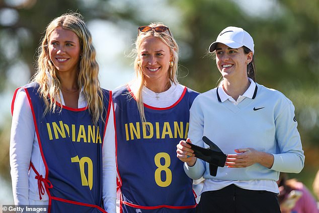 Caitlin Clark (R) is pictured with Lexie Hull (L) and Sophie Cunningham at The ANNIKA