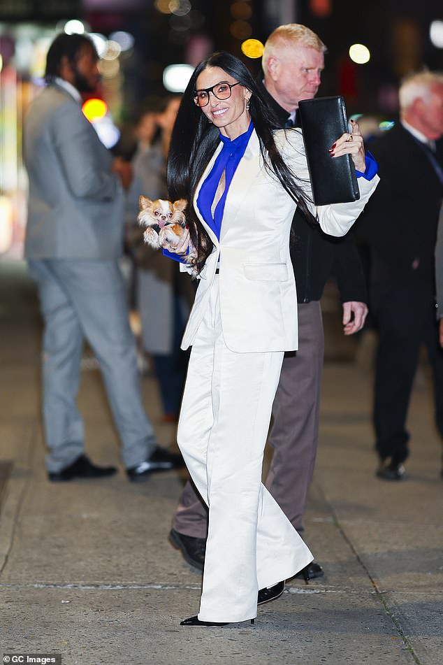 Demi Moore was the picture of sophistication on Monday evening as she made her way to The Late Show With Stephen Colbert in New York City, accompanied, as always, with her beloved dog Pilaf