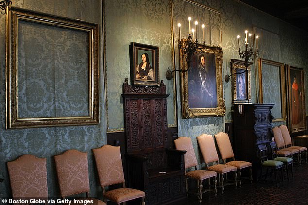 Spaces for missing Rembrandt paintings 'A Lady and Gentlemen in Black,' circa 1633, and 'The Storm on the Sea Of Galilee,' also circa 1633, seen on the walls of the Gardner Museum