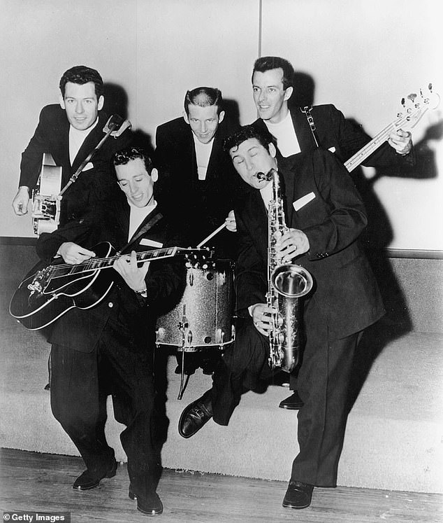 Burgess, who died October 19 in Dover, Tenn., played was the bandleader and rhythm guitarist for The Champs. The group toped the Billboard pop charts in 1958 with Tequila; Burgess is pictured with The Champs in 1958
