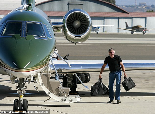 Harrison Ford has eviscerated Donald Trump again over his handling of the climate crisis - despite owning a private jet himself; pictured 2010