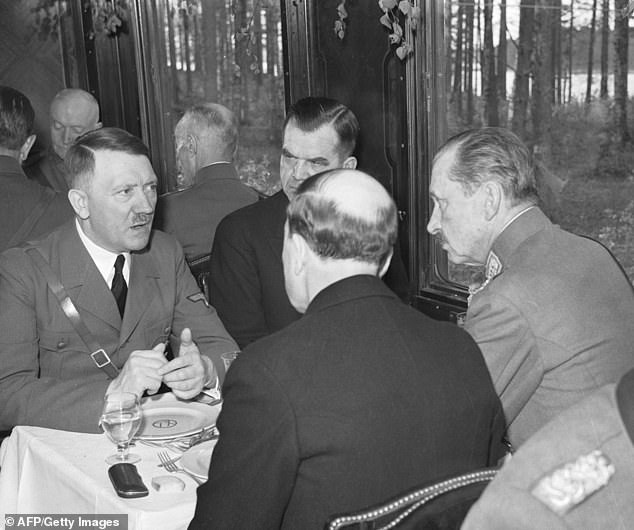The clip was made by a Finnish sound engineer in 1942 without the Nazi dictator's knowledge, during a meeting (pictured) with Finnish military chief Carl Mannerheim
