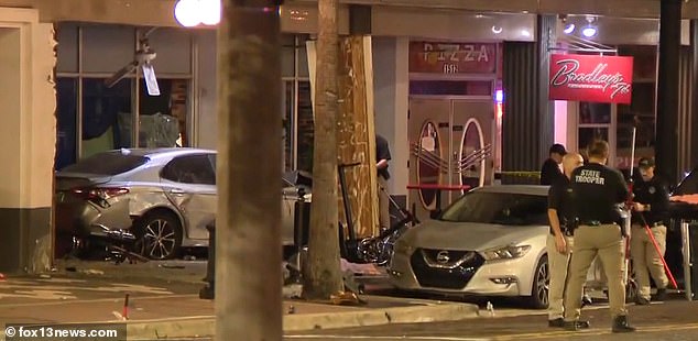 Silas Sampson, 22, of Dade City, was allegedly driving recklessly and being chased by police when his car slammed into Bradley's bar on 7th Avenue, hitting more than a dozen people on the patio