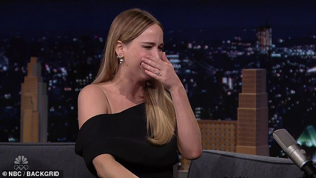Jennifer Lawrence left Jimmy Fallon squirming as she repeatedly burst into tears during a car-crash interview on The Tonight Show